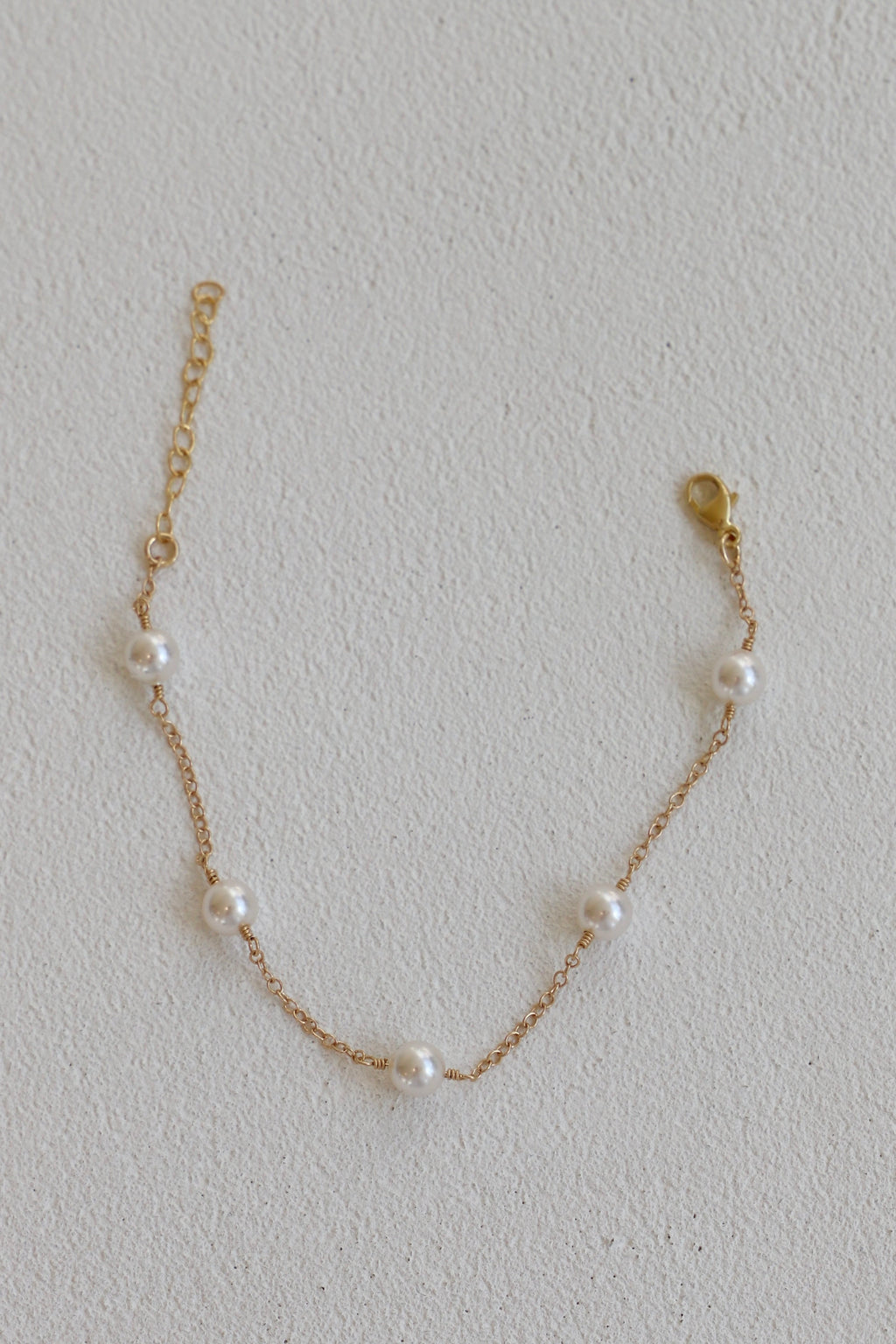 GOLD PEARL STATION BRACELET